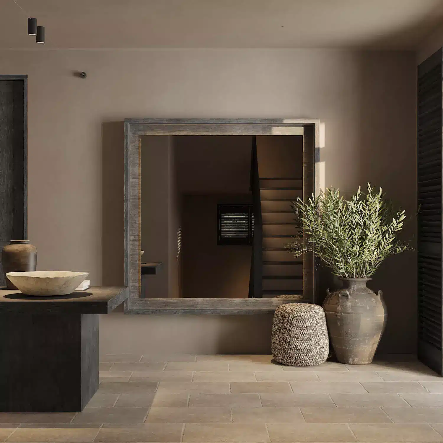 北歐侘寂風植栽佈置:捨棄繁茂花叢,改以姿態清瘦的枯枝或大葉植物營造視覺焦點,為靜謐的侘寂空間點亮優雅的生命律動。