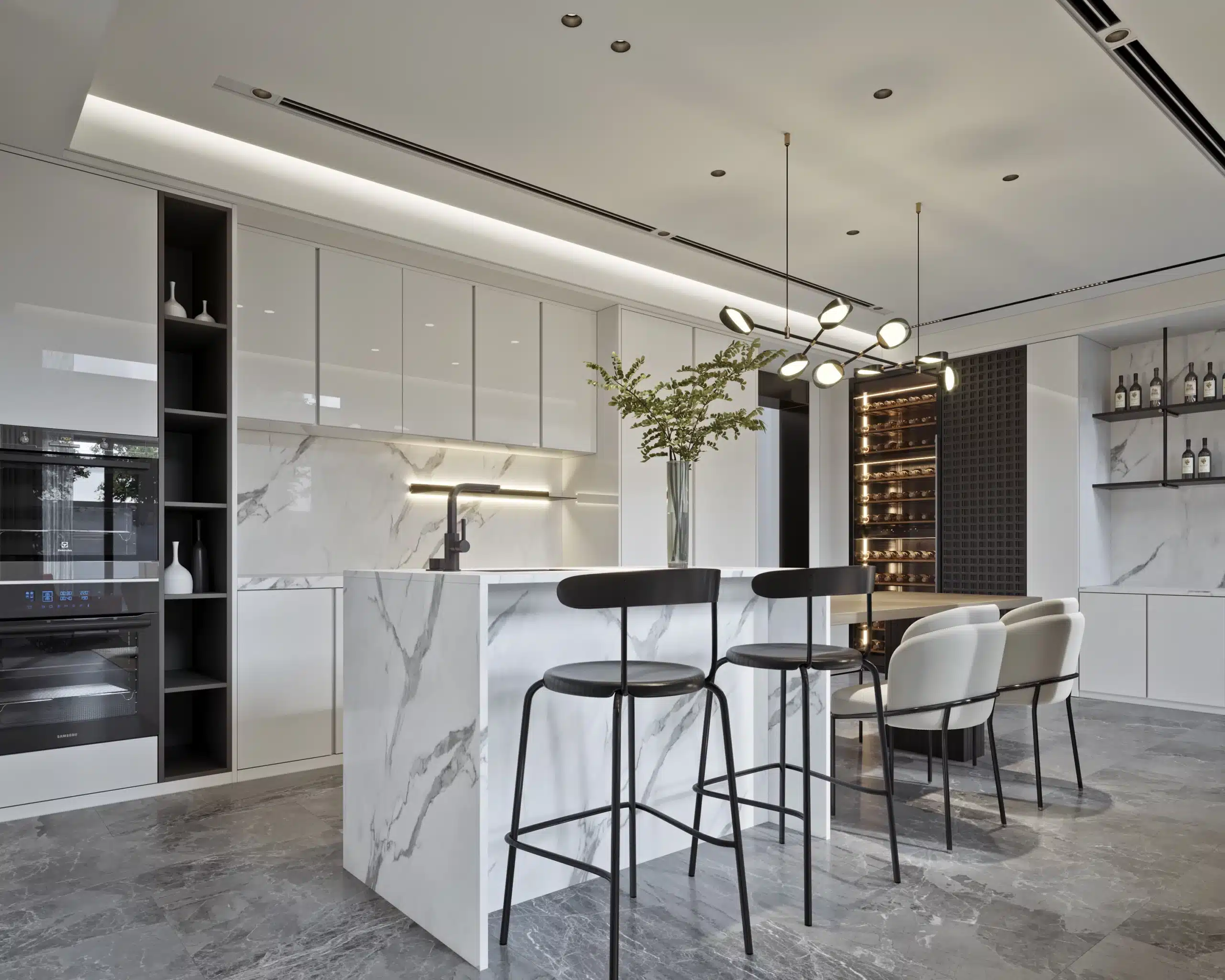 嵌入式廚房家電牆設計，整合 Gaggenau 烤箱塔與隱藏式頂級冰箱。