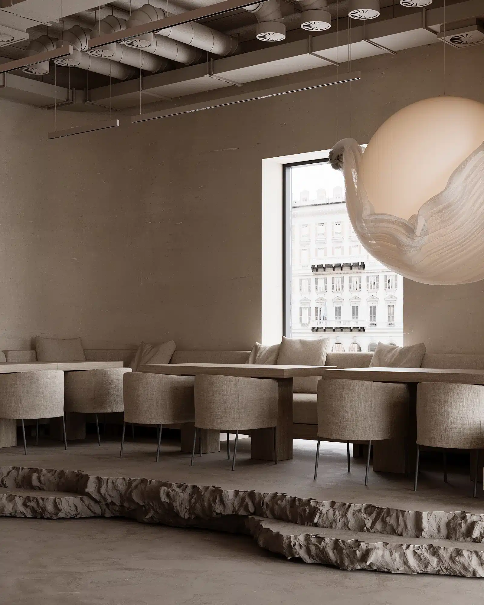 採用暖白色調、流線型桌椅與大面積通透採光，營造清新品牌形象。