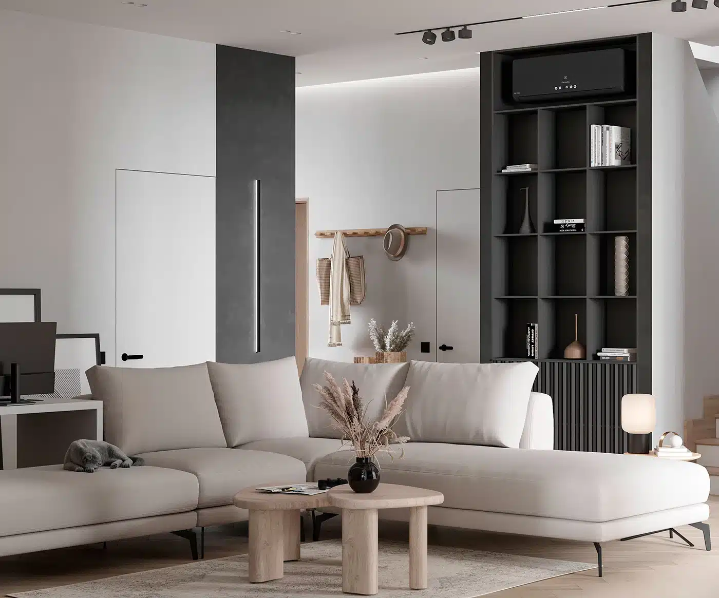 適合親子家庭的北歐風客廳，選用防碰撞的圓角木質茶几與低背米色沙發，後方設有黑色頂天立地書櫃，兼具收納與展示功能。