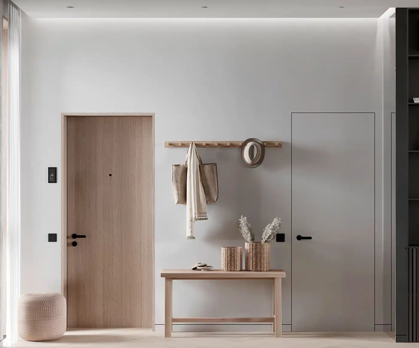 極簡北歐風玄關，配置實木穿鞋椅與牆面掛勾，搭配隱藏式門片設計，打造機能與美感兼具的入門端景。